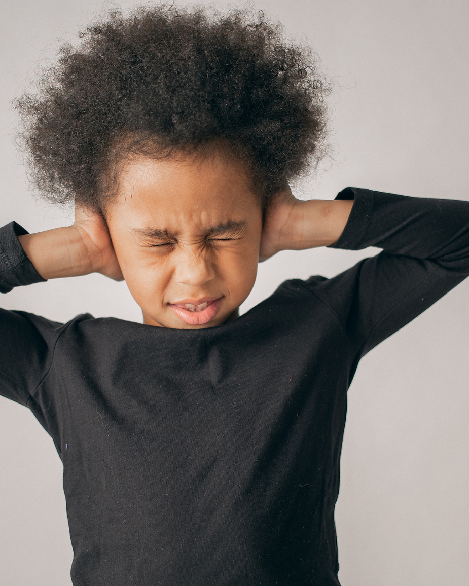 Child in a black shirt having emotional dyregulation